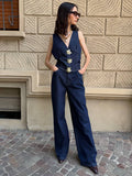 Completo denim con bottoni fiore